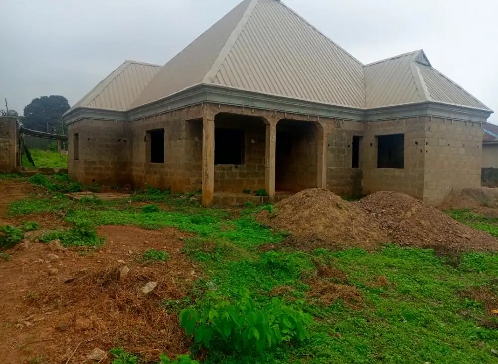Hipped-roof bungalow, roofed and ready for finishing