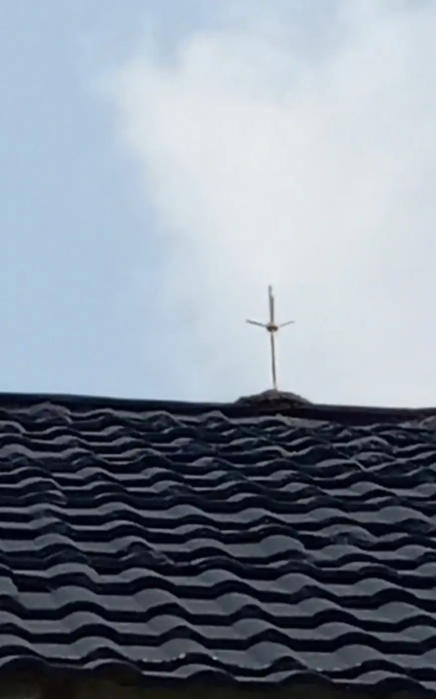 Lightning rod at the ridge of a tiled roof