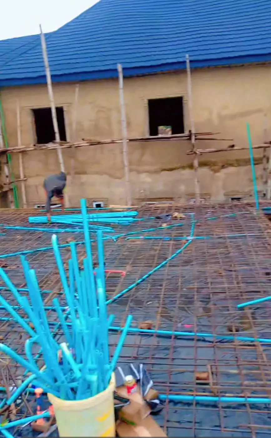 Electrical conduits laid on slab reinforcement